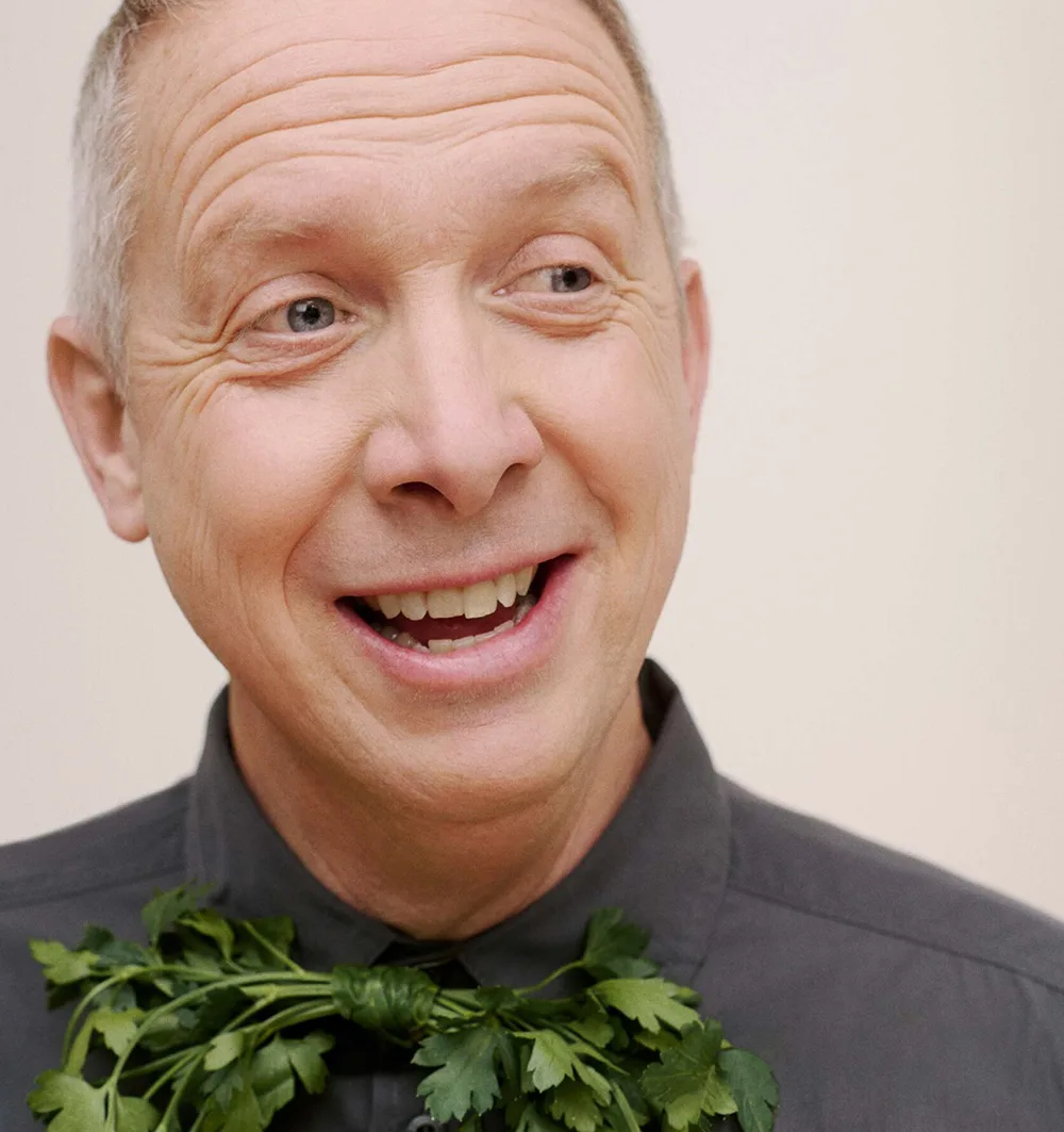Hotel Assistant with a bow tie made out of parsley