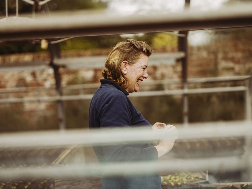 Farmer in growing shed