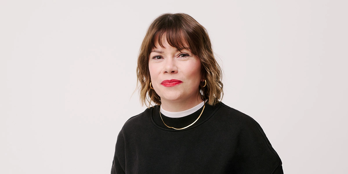 Person looking confidently into camera