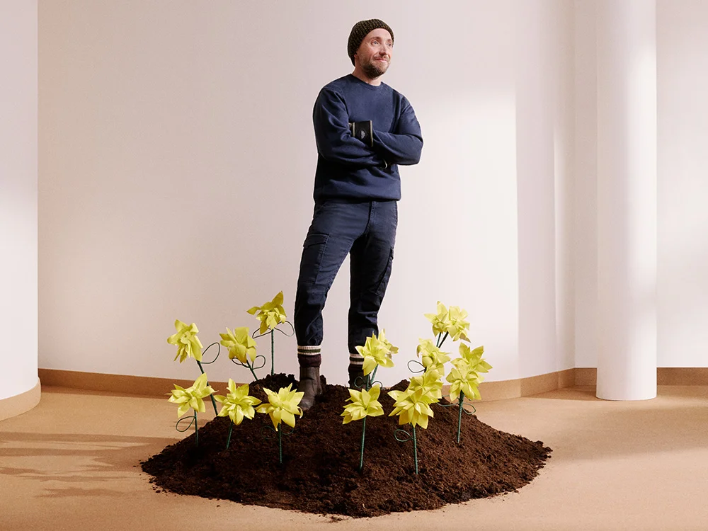 Conceptual image of man standing in daffodil patch