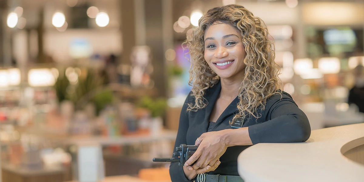 Shop Assistant smiling at camera