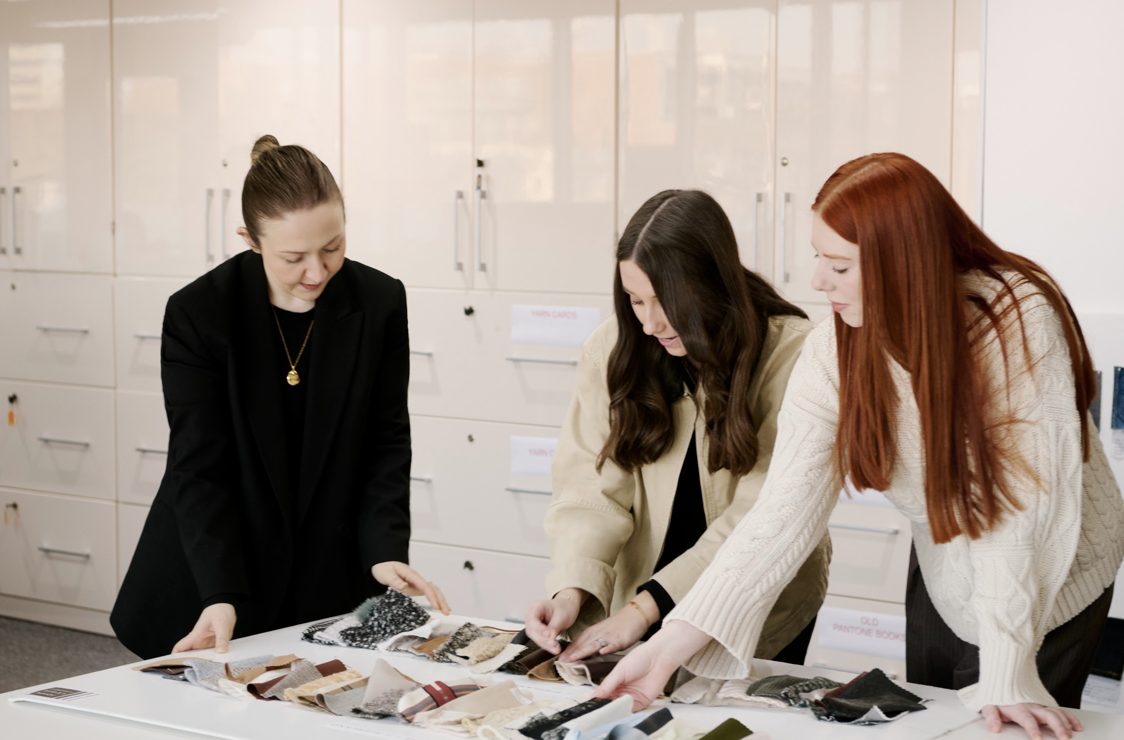 John Lewis Head Office Partners discussing sample fabrics