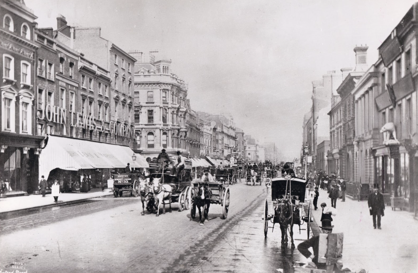 An old black and white image of the first John Lewis shop on Oxford Street, London in 1864.